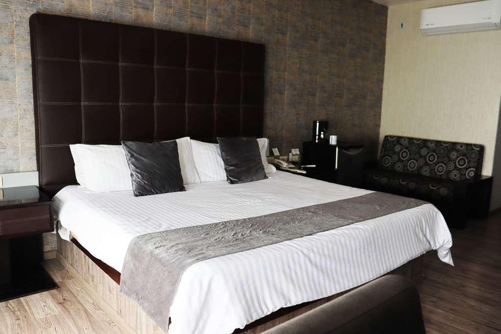 Wyndham Garden Aguascalientes Hotell Rom bilde